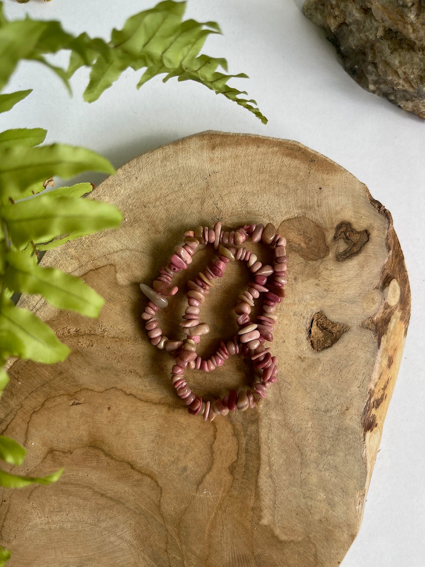Split armband Rhodoniet